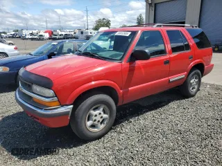 2000 Chevrolet Blazer LT z VIN 1GNDT13W8Y2392666, wystawiony jako Copart lot #56652895 z przebiegiem 223 924 mil mil oraz Szkoda całkowita • Salvage title. Historia ofert i sprzedaży dostępna na DreamBid. Obrazek 1.