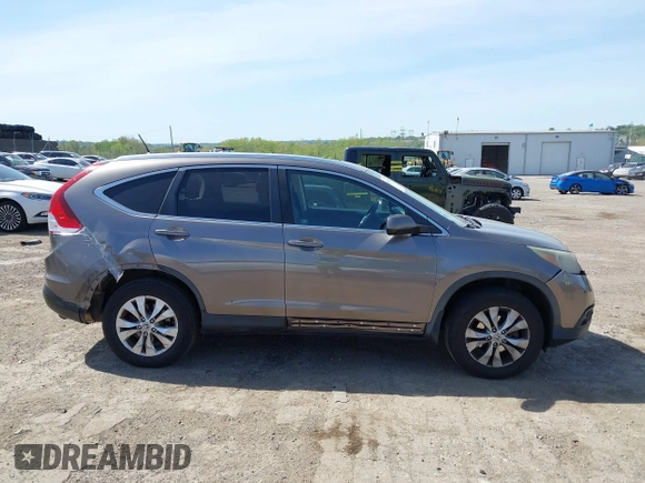 2012 Honda CR-V EX-L with VIN 5J6RM4H73CL012564, listed as a IAAI auction lot 42156438 with 165,346 mi miles and . Bid and sale history available at DreamBid. Image 14.