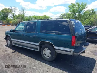 1997 GMC Suburban with VIN 1GKFK16R6VJ706590, listed as a IAAI auction lot 42194855 with 155,680 mi miles and . Bid and sale history available at DreamBid. Image 3.