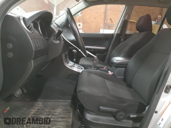 2012 Suzuki Grand Vitara Premium z VIN JS3TD0D2XC4100425, wystawiony jako Copart lot #49080815 z przebiegiem 108 780 mil mil oraz Szkody całkowita. Historia ofert i sprzedaży dostępna na DreamBid. Obrazek 7.