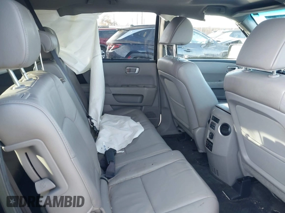 2012 Honda Pilot Touring with VIN 5FNYF4H93CB077057, listed as a IAAI auction lot 41156160 with 139,834 mi miles and . Bid and sale history available at DreamBid. Image 8.