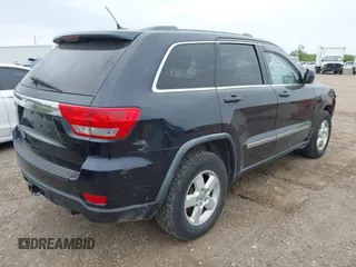 2011 Jeep Grand Cherokee Laredo with VIN 1J4RR4GG9BC608778, listed as a IAAI auction lot 42314313 with 151,780 mi miles and . Bid and sale history available at DreamBid. Image 4.