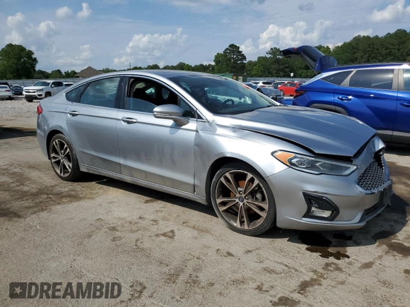2020 Ford Fusion Titanium with VIN 3FA6P0D97LR138594, listed as a Copart auction lot 57755565 with Not provided miles and Clean title. Bid and sale history available at DreamBid. Image 4.
