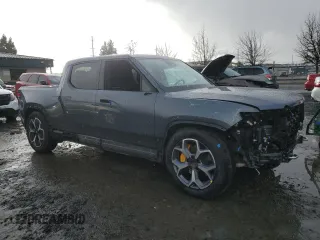 2022 Rivian R1T Adventure z VIN 7FCTGAAA5NN014941, wystawiony jako Copart lot #43771755 z przebiegiem 43 410 mil mil oraz Szkody całkowita. Historia ofert i sprzedaży dostępna na DreamBid. Obrazek 4.