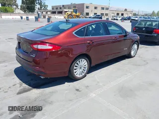 2015 Ford Fusion SE Hybrid с VIN 3FA6P0LU2FR310783, выставлен на аукционе IAAI как лот 42617746 с пробегом 47 264 миль миль и . История ставок и продаж доступна на DreamBid. Изображение 4.