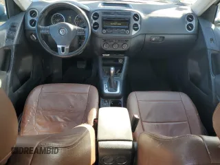 2014 Volkswagen Tiguan SE z VIN WVGAV3AX9EW563907, wystawiony jako Copart lot #45157495 z przebiegiem 100 174 mil mil oraz Szkoda całkowita • Salvage title. Historia ofert i sprzedaży dostępna na DreamBid. Obrazek 8.
