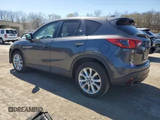 2014 Mazda CX-5 Grand Touring with VIN JM3KE4DY4E0422739, listed as a Copart auction lot 53234745 with 54,152 mi miles and Salvage Title. Bid and sale history available at carsss.com. Image 2.