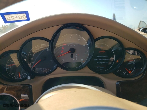 2014 Porsche Panamera GTS with VIN WP0AF2A73EL083388, listed as a Copart auction lot 74312004 with 106,386 mi miles and Salvage Title. Bid and sale history available at carsss.com. Image 9.