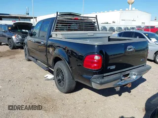 2003 Ford F-150 XLT with VIN 1FTRW07L43KB05221, listed as a IAAI auction lot 41762332 with 226,660 mi miles. Bid and sale history available at carsss.com. Image 3.