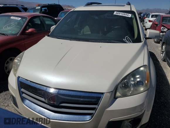 2007 Saturn Outlook XR z VIN 5GZEV23717J174383, wystawiony jako Copart lot #66915944 z przebiegiem 128 885 mil mil oraz Szkoda całkowita • Salvage title. Historia ofert i sprzedaży dostępna na DreamBid. Obrazek 5.