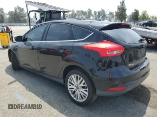 2018 Ford Focus Titanium с VIN 1FADP3N28JL250097, выставлен на аукционе Copart как лот 59972575 с пробегом 127 773 миль миль и Списание • Salvage title. История ставок и продаж доступна на DreamBid. Изображение 2.