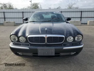 2004 Jaguar XJ with VIN SAJEA71C94SG11566, listed as a Copart auction lot 85281684 with 107,054 mi miles and Clean Title. Bid and sale history available at carsss.com. Image 5.