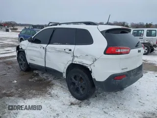 2016 Jeep Cherokee Altitude with VIN 1C4PJLAB4GW376723, listed as a IAAI auction lot 41593248 with 96,940 mi miles and . Bid and sale history available at DreamBid. Image 3.