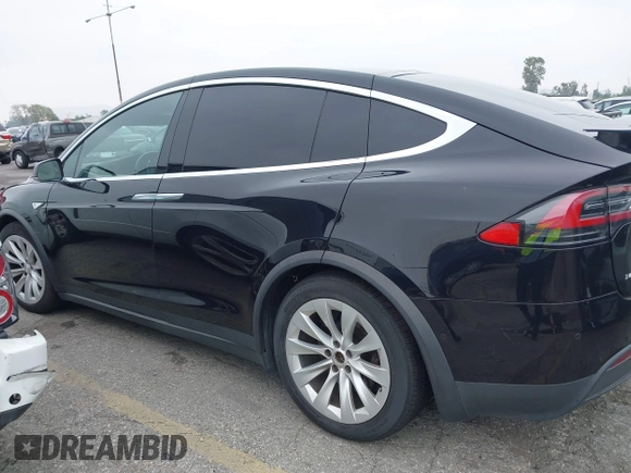2016 Tesla Model X 70D with VIN 5YJXCBE2XGF019095, listed as a IAAI auction lot 42025230 with 109,660 mi miles and . Bid and sale history available at DreamBid. Image 14.