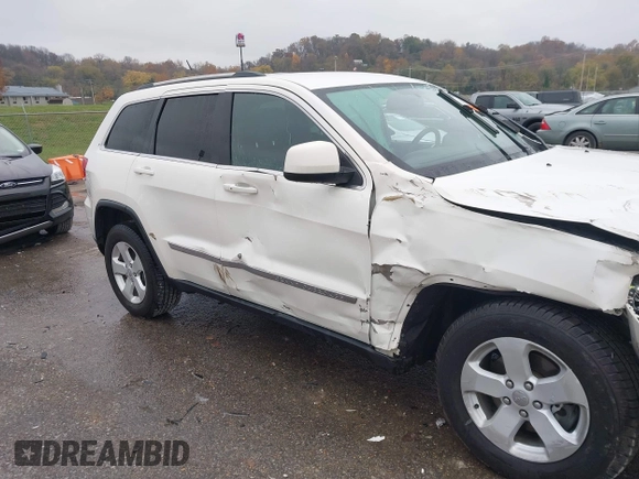2012 Jeep Grand Cherokee Laredo with VIN 1C4RJFAG6CC297958, listed as a IAAI auction lot 40859811 with 213,499 mi miles. Bid and sale history available at carsss.com. Image 17.