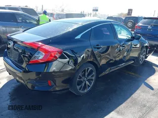 2021 Honda Civic Sport with VIN 2HGFC2F81MH529499, listed as a IAAI auction lot 41836215 with 55,833 mi miles and . Bid and sale history available at DreamBid. Image 4.