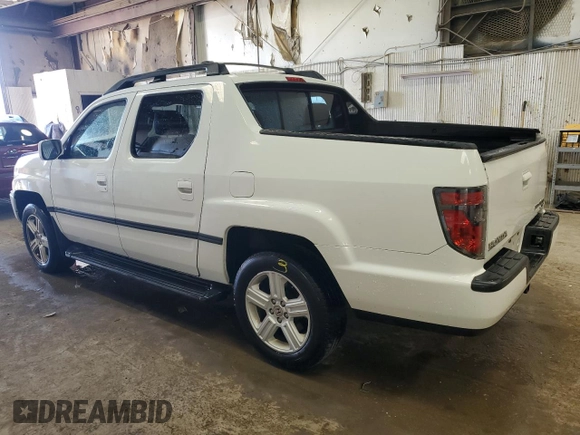 2014 Honda Ridgeline RTL with VIN 5FPYK1F53EB009121, listed as a Copart auction lot 62029614 with Not Provided miles and Clean Title. Bid and sale history available at carsss.com. Image 2.