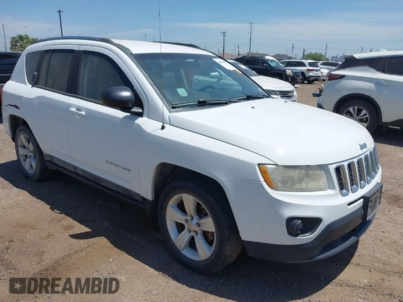 2011 Jeep Compass with VIN 1J4NT1FA3BD139578, listed as a IAAI auction lot 42058499 with 159,322 mi miles. Bid and sale history available at carsss.com. Image 1.