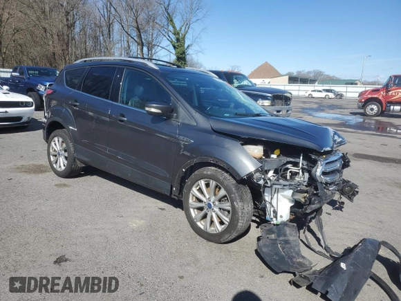 2017 Ford Escape Titanium with VIN 1FMCU9J99HUB91050, listed as a Copart auction lot 50407245 with 40,242 mi miles and Salvage Title. Bid and sale history available at carsss.com. Image 4.