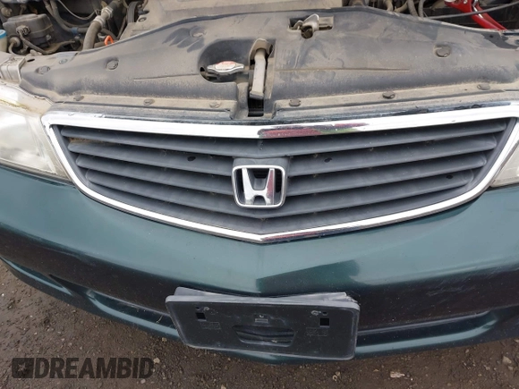2000 Honda Odyssey EX z VIN 2HKRL1865YH010129, wystawiony jako IAAI lot #42258113 z przebiegiem 191 713 mil mil oraz . Historia ofert i sprzedaży dostępna na DreamBid. Obrazek 6.