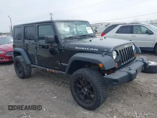 2008 Jeep Wrangler Rubicon z VIN 1J8GA69128L547347, wystawiony jako IAAI lot #41985787 z przebiegiem 151 461 mil mil oraz . Historia ofert i sprzedaży dostępna na DreamBid. Obrazek 1.