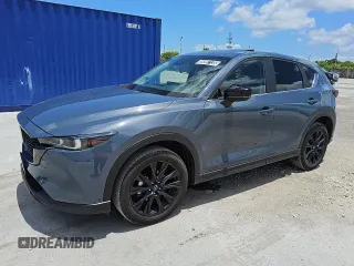 2024 Mazda CX-5 S Carbon Edition z VIN JM3KFBCL3R0481732, wystawiony jako Copart lot #56997135 z przebiegiem 32 887 mil mil oraz Tytuł czysty. Historia ofert i sprzedaży dostępna na DreamBid. Obrazek 1.