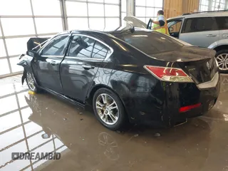 2009 Acura TL Tech with VIN 19UUA86549A010863, listed as a IAAI auction lot 41001252 with 186,441 mi miles. Bid and sale history available at carsss.com. Image 3.