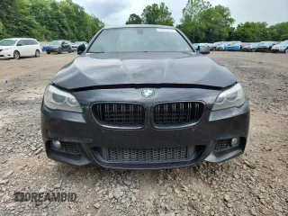 2013 BMW 5 Series 550i xDrive with VIN WBAFU9C55DDY72065, listed as a Copart auction lot 63023675 with 117,592 mi miles and Salvage title. Bid and sale history available at DreamBid. Image 5.