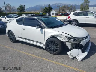 2015 Scion tC with VIN JTKJF5C71F3095189, listed as a IAAI auction lot 41847417 with 129,164 mi miles. Bid and sale history available at carsss.com. Image 1.