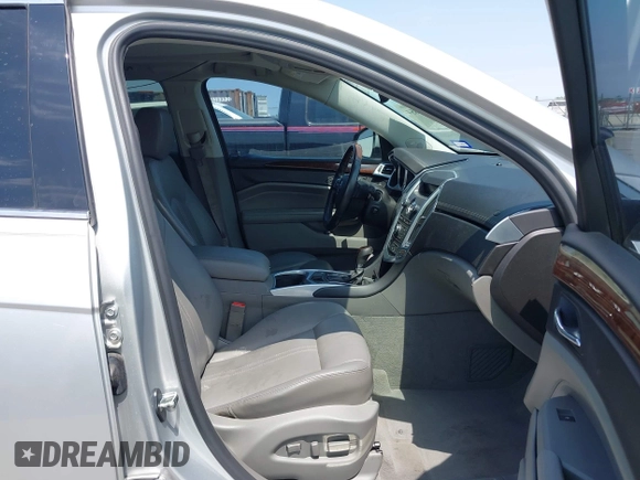 2011 Cadillac SRX Premium Collection with VIN 3GYFNCEY2BS594415, listed as a IAAI auction lot 42042854 with 130,894 mi miles and . Bid and sale history available at DreamBid. Image 5.