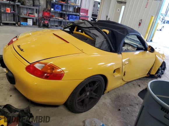 2002 Porsche Boxster z VIN WP0CA29832U621890, wystawiony jako Copart lot #88170475 z przebiegiem 156 954 mil mil oraz Szkoda całkowita • Salvage title. Historia ofert i sprzedaży dostępna na DreamBid. Obrazek 3.