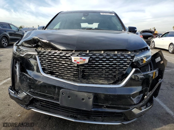 2023 Cadillac XT6 FWD Premium Luxury with VIN 1GYKPCRS5PZ200527, listed as a Copart auction lot 82838044 with 45,015 mi miles and Salvage Title. Bid and sale history available at carsss.com. Image 5.