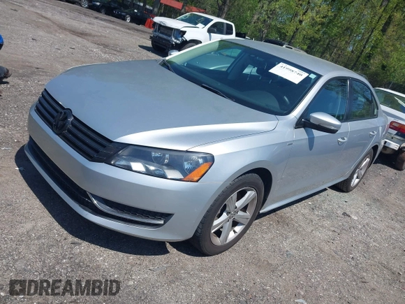 2014 Volkswagen Passat Wolfsburg Edition with VIN 1VWAT7A36EC045573, listed as a IAAI auction lot 41998740 with 151,633 mi miles and . Bid and sale history available at DreamBid. Image 2.