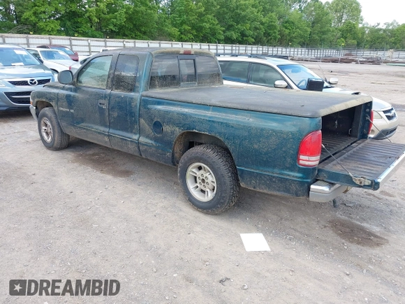 1998 Dodge Dakota SLT with VIN 1B7GL22X4WS554408, listed as a IAAI auction lot 42202021 with 147,765 mi miles. Bid and sale history available at carsss.com. Image 3.