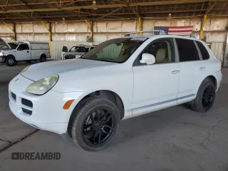 2005 Porsche Cayenne z VIN WP1AA29P25LA24169, wystawiony jako Copart lot #55803255 z przebiegiem 117 630 mil mil oraz Czysty tytuł • Clean title. Historia ofert i sprzedaży dostępna na DreamBid. Obrazek 1.