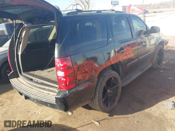 2008 Chevrolet Tahoe 3LT with VIN 1GNFC13J68R156148, listed as a IAAI auction lot 41607340 with 154,533 mi miles and . Bid and sale history available at DreamBid. Image 4.