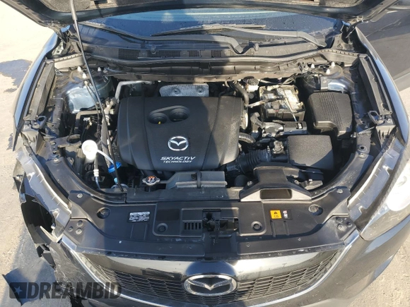 2015 Mazda CX-5 Sport z VIN JM3KE2BE6F0491107, wystawiony jako Copart lot #42462395 z przebiegiem 82 528 mil mil oraz Szkoda całkowita • Salvage title. Historia ofert i sprzedaży dostępna na DreamBid. Obrazek 14.