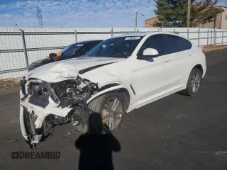 2021 BMW X4 xDrive30i with VIN 5UX2V1C09M9F12676, listed as a Copart auction lot 85573794 with 999,999 mi miles and Clean Title. Bid and sale history available at carsss.com. Image 1.