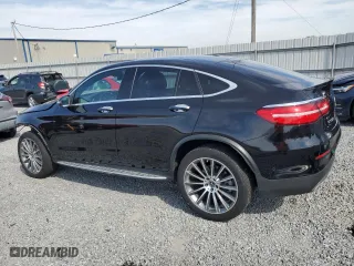 2019 Mercedes-Benz GLC with VIN WDC0J4KB8KF598819, listed as a Copart auction lot 49223885 with 59,937 mi miles and Salvage Title. Bid and sale history available at carsss.com. Image 2.