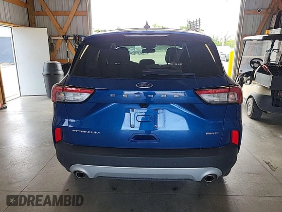 2022 Ford Escape Titanium with VIN 1FMCU9J97NUA64891, listed as a IAAI auction lot 42733833 with 88,884 mi miles and . Bid and sale history available at DreamBid. Image 10.