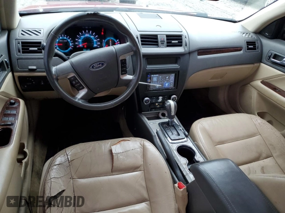 2012 Ford Fusion SEL z VIN 3FAHP0JG2CR309554, wystawiony jako Copart lot #60869895 z przebiegiem 199 134 mil mil oraz Szkoda całkowita • Salvage title. Historia ofert i sprzedaży dostępna na DreamBid. Obrazek 8.