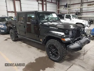 2024 Jeep Gladiator Willys with VIN 1C6HJTAG3RL117149, listed as a IAAI auction lot 41739320 with 6,073 mi miles and . Bid and sale history available at DreamBid. Image 1.