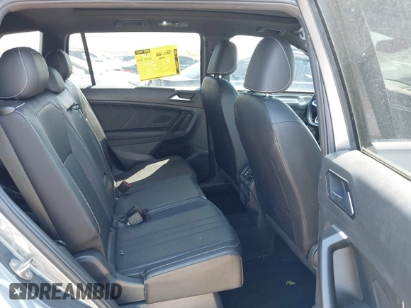 2023 Volkswagen Tiguan SE R-Line Black z VIN 3VVCB7AX1PM057201, wystawiony jako IAAI lot #41977239 z przebiegiem 84 840 mil mil oraz . Historia ofert i sprzedaży dostępna na DreamBid. Obrazek 8.