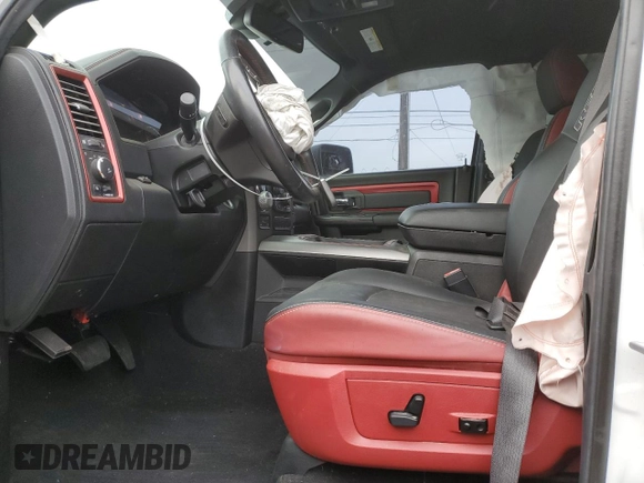 2018 Ram 1500 Rebel with VIN 1C6RR7YT7JS235965, listed as a Copart auction lot 84749674 with 61,484 mi miles and Salvage title. Bid and sale history available at DreamBid. Image 7.