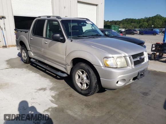 2004 Ford Explorer Sport Trac XLS with VIN 1FMZU67K24UB65144, listed as a Copart auction lot 52611305 with 211,806 mi miles and Salvage title. Bid and sale history available at DreamBid. Image 4.