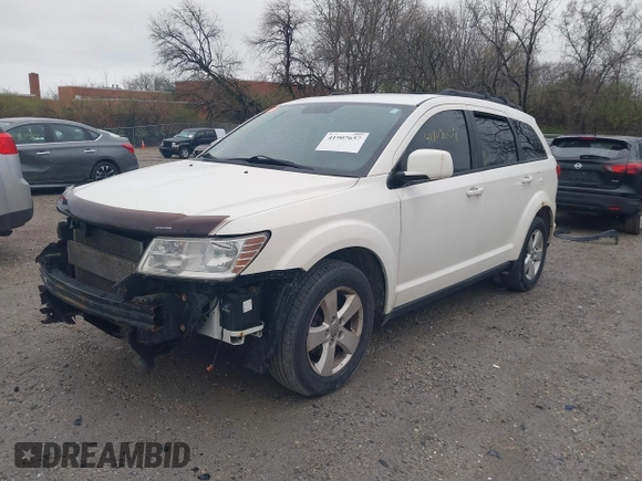2012 Dodge Journey SXT with VIN 3C4PDCCG6CT132457, listed as a IAAI auction lot 41907657 with 169,160 mi miles and . Bid and sale history available at DreamBid. Image 2.