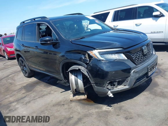 2021 Honda Passport Elite with VIN 5FNYF8H07MB003506, listed as a IAAI auction lot 42571906 with 42,323 mi miles and . Bid and sale history available at DreamBid. Image 6.