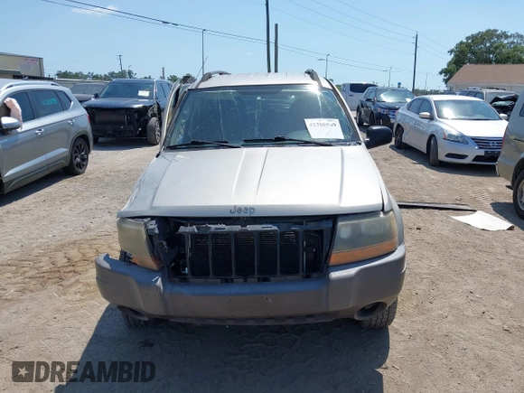 2004 Jeep Grand Cherokee Laredo z VIN 1J4GW48SX4C283922, wystawiony jako IAAI lot #42306869 z przebiegiem 263 812 mil mil oraz . Historia ofert i sprzedaży dostępna na DreamBid. Obrazek 11.
