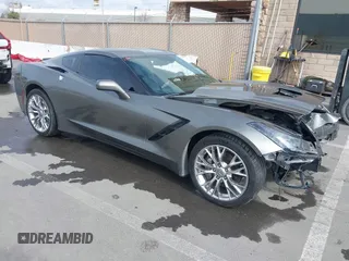 2015 Chevrolet Corvette 1LT z VIN 1G1YB2D73F5107130, wystawiony jako IAAI lot #41604689 z przebiegiem 87 439 mil mil oraz . Historia ofert i sprzedaży dostępna na DreamBid. Obrazek 1.