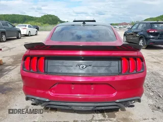 2020 Ford Mustang EcoBoost z VIN 1FA6P8TH6L5149788, wystawiony jako IAAI lot #42179624 z przebiegiem 107 520 mil mil oraz . Historia ofert i sprzedaży dostępna na DreamBid. Obrazek 16.